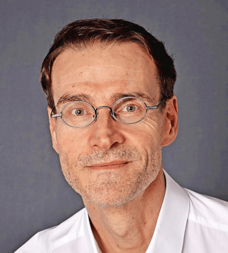 Porträtfoto des Interviewten Prof. Dr. Dr. Jürgen Gießing